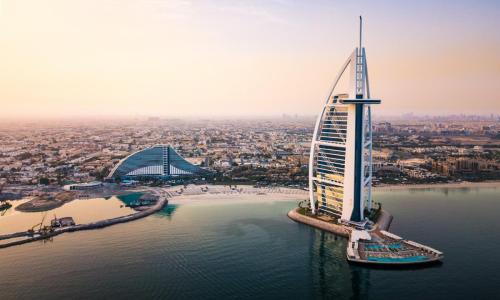 Dubai,Seaside,Skyline,And,Burj,Al,Arab,Luxury,Hotel,Aerial